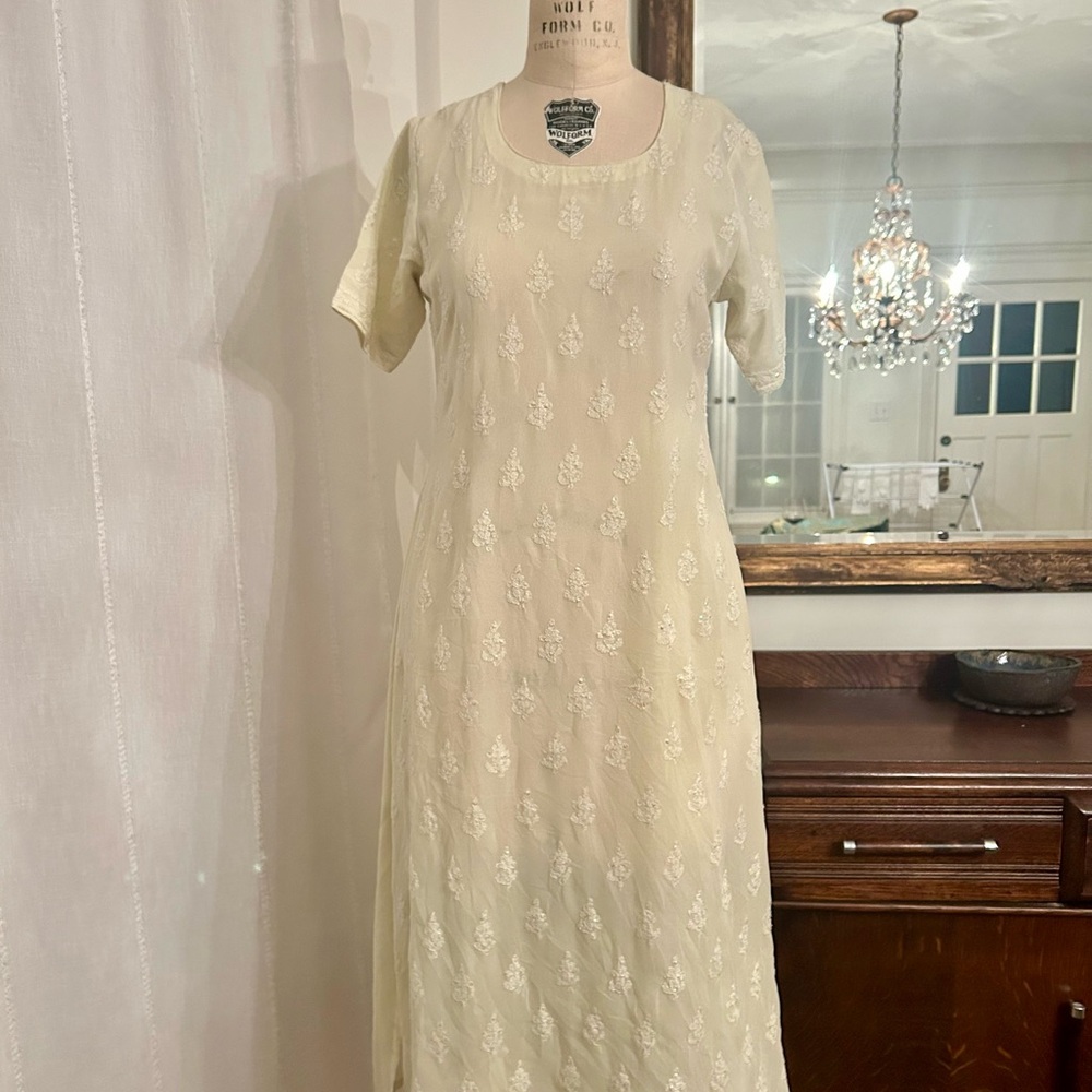 Pale yellow dress with side slits
